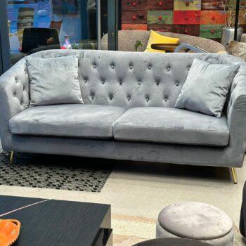 Canapé en velours gris capitonnée