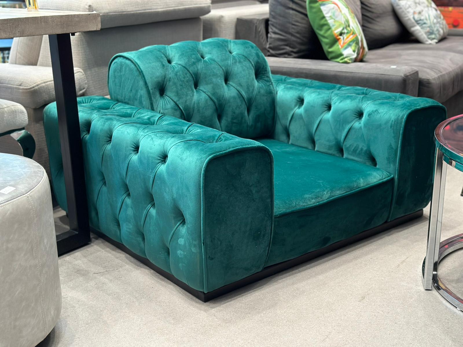 Fauteuil d'appoint capitonnée en velours vert