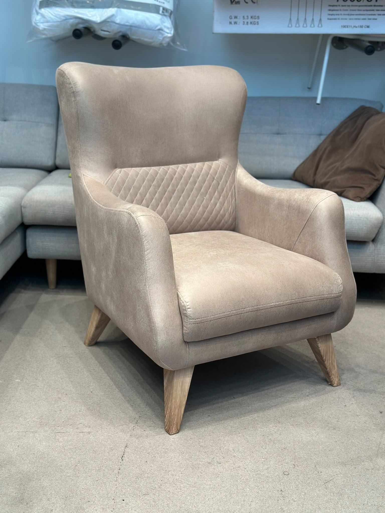 Fauteuil en velours beige
